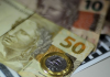 Caixa paga hoje Auxílio Brasil para beneficiários com NIS final 9