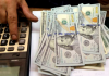 Dólar sobe para R$ 5,46 e fecha no maior valor em seis meses