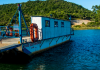 Veículo cai no rio ao acessar a balsa