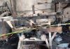 Bombeiros combatem incêndio em máquina agrícola em garagem na cidade de Ermo